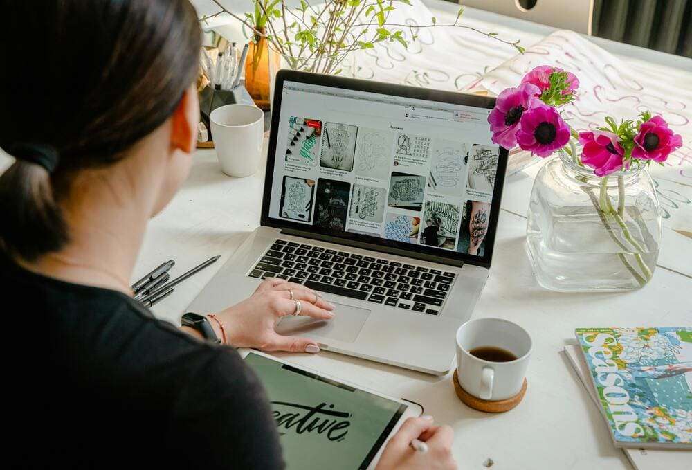 Break your website which shows a company owner looking at her website wondering why it isn't working correctly and driving traffic and conversions